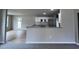 Modern kitchen with granite countertops and white cabinets at 158 Scotties Ridge Dr, Princeton, NC 27569