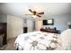 Comfortable bedroom with ceiling fan, carpet, and plenty of light at 101 Mulberry Ln, Dunn, NC 28334