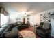Living area featuring a sectional sofa and hardwood floors at 101 Mulberry Ln, Dunn, NC 28334