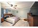 Spacious main bedroom with ceiling fan and large dresser at 101 Mulberry Ln, Dunn, NC 28334