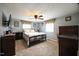 Spacious bedroom with ceiling fan, carpet, and ample closet space at 101 Mulberry Ln, Dunn, NC 28334