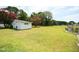 Large backyard with shed and beautiful crepe myrtles at 101 Mulberry Ln, Dunn, NC 28334