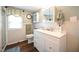 Clean bathroom with white vanity and a shower/tub combo at 101 Mulberry Ln, Dunn, NC 28334
