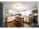 Updated kitchen with stainless steel appliances and an island at 101 Mulberry Ln, Dunn, NC 28334