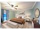 Large bedroom with plush bedding and plenty of light at 101 Mulberry Ln, Dunn, NC 28334