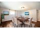 Bright dining room featuring a wood table and six chairs at 101 Mulberry Ln, Dunn, NC 28334