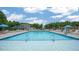 Inviting community pool with plenty of lounge chairs at 543 Old Battle Bridge Rd, Wendell, NC 27591