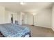 Spacious bedroom with carpeted floor and ample closet space at 6425 Swatner Dr, Raleigh, NC 27612