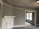 Living room featuring a fireplace and gray walls at 3124 Raleigh Rd, Henderson, NC 27537