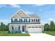Two-story house with gray siding, white trim, and a two-car garage at 508 Impala Trce, Wendell, NC 27591