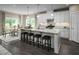 Spacious kitchen with white cabinets, granite countertops, and a large island at 508 Impala Trce, Wendell, NC 27591