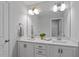 Clean bathroom with double vanity and large mirror at 541 Henham Way, Zebulon, NC 27597