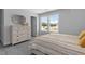 Charming bedroom with a queen bed and dresser at 541 Henham Way, Zebulon, NC 27597