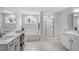 Elegant bathroom with double vanity, soaking tub, and separate shower at 541 Henham Way, Zebulon, NC 27597