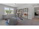 Fun playroom with two beanbag chairs, built-in shelving and desks at 541 Henham Way, Zebulon, NC 27597