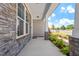 Covered back patio with access from the house at 541 Henham Way, Zebulon, NC 27597