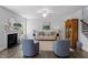 Living room with hardwood floors, a fireplace, and comfortable seating at 541 Henham Way, Zebulon, NC 27597