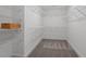 Large walk-in closet with wire shelving; great storage at 541 Henham Way, Zebulon, NC 27597