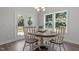 Charming breakfast nook with a round table and access to the backyard patio at 541 Henham Way, Zebulon, NC 27597