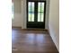 Hardwood floors in the entryway at 200 Whistlers Cv, Louisburg, NC 27549