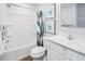 Bathroom with shower/tub combo and white vanity at 4507 Black Drum Dr, Raleigh, NC 27616