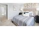 Spacious bedroom with large bed, ample closet space and natural light at 4511 Black Drum Dr, Raleigh, NC 27616