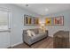 Finished basement recreation area with comfortable seating and a home bar at 4511 Black Drum Dr, Raleigh, NC 27616
