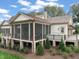 Charming home with screened porch, patio, and lush landscaping at 1641 Legacy Ridge Ln, Wake Forest, NC 27587