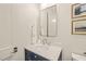 Elegant bathroom with navy vanity, marble countertop, and stylish fixtures at 1641 Legacy Ridge Ln, Wake Forest, NC 27587