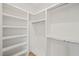 Walk-in closet with built-in shelving and hanging rods at 1641 Legacy Ridge Ln, Wake Forest, NC 27587