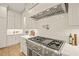 Chef's kitchen with stainless steel appliances, gas range, and white cabinets at 1641 Legacy Ridge Ln, Wake Forest, NC 27587