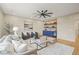 Inviting living room with wet bar, exposed brick, and hardwood floors at 1641 Legacy Ridge Ln, Wake Forest, NC 27587