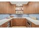 Well-appointed pantry or second kitchen with wood cabinetry, countertops, and a sink at 1641 Legacy Ridge Ln, Wake Forest, NC 27587