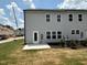 Gray siding house with a backyard patio and landscaping at 3125 Ranger Dr # 42, Durham, NC 27703