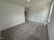 Spacious bedroom with carpet flooring and two closets at 3125 Ranger Dr # 42, Durham, NC 27703