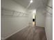 Large walk-in closet with ample shelving at 3125 Ranger Dr # 42, Durham, NC 27703