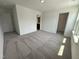 Spacious bedroom with carpet flooring and private bath access at 3125 Ranger Dr # 42, Durham, NC 27703