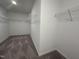 Spacious walk-in closet with wire shelving at 3125 Ranger Dr # 42, Durham, NC 27703