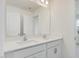 Bathroom with double vanity and mirror at 46 Nailsworth St, Angier, NC 27501