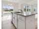 Kitchen island with granite countertop and stainless steel dishwasher at 46 Nailsworth St, Angier, NC 27501