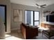 Bright living room with modern furniture and large windows at 512 Gordon St # 407, Durham, NC 27701
