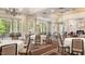 Elegant banquet hall with large windows and chandeliers at 11548 Helmond Way # 116, Raleigh, NC 27617