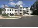 Two-story building exterior with ample parking at 11548 Helmond Way # 109, Raleigh, NC 27617