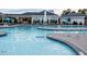 Freeform community pool with lounge area at 420 White Mulberry Ln, Holly Springs, NC 27540