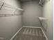 Large walk-in closet with wire shelving at 86 Scotties Ridge Dr, Princeton, NC 27569