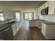 Open concept kitchen featuring granite countertops and ample cabinet space at 86 Scotties Ridge Dr, Princeton, NC 27569