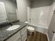 Full bathroom with a single vanity and shower/tub combo at 86 Scotties Ridge Dr, Princeton, NC 27569