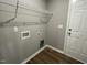 Convenient laundry room with built-in shelving at 86 Scotties Ridge Dr, Princeton, NC 27569