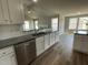 Eat-in kitchen with granite countertops, stainless steel appliances, and hardwood floors at 86 Scotties Ridge Dr, Princeton, NC 27569