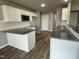 Modern kitchen with granite countertops and stainless steel appliances at 86 Scotties Ridge Dr, Princeton, NC 27569